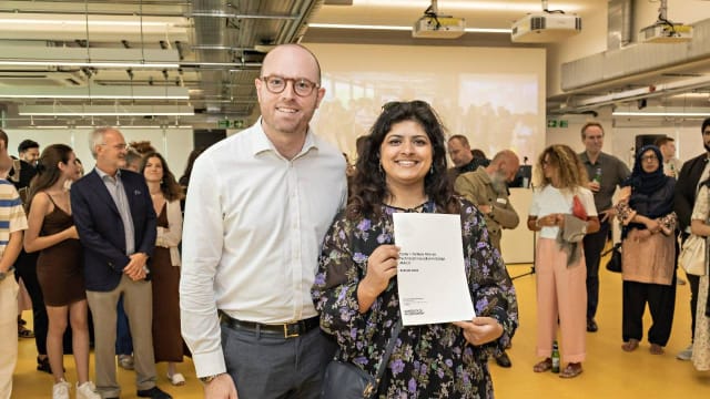 Student with certificate at Open 22